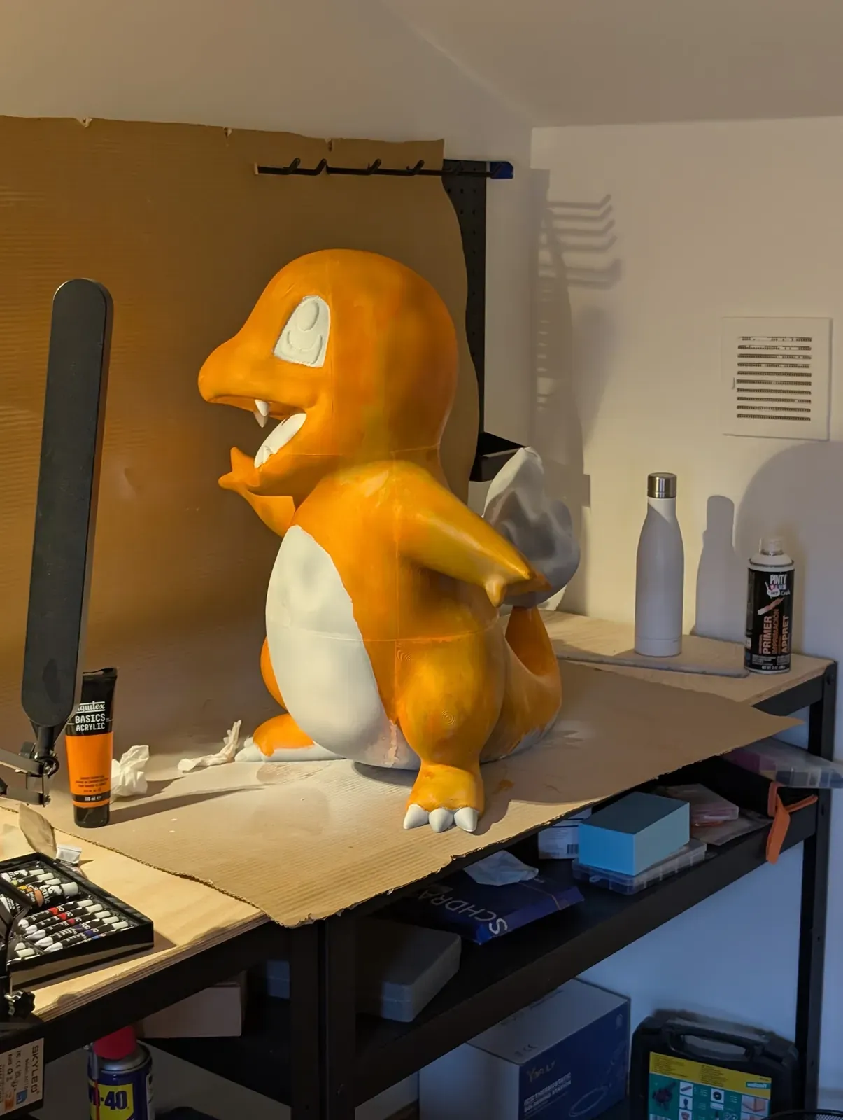 Charmander with the first coats of paint