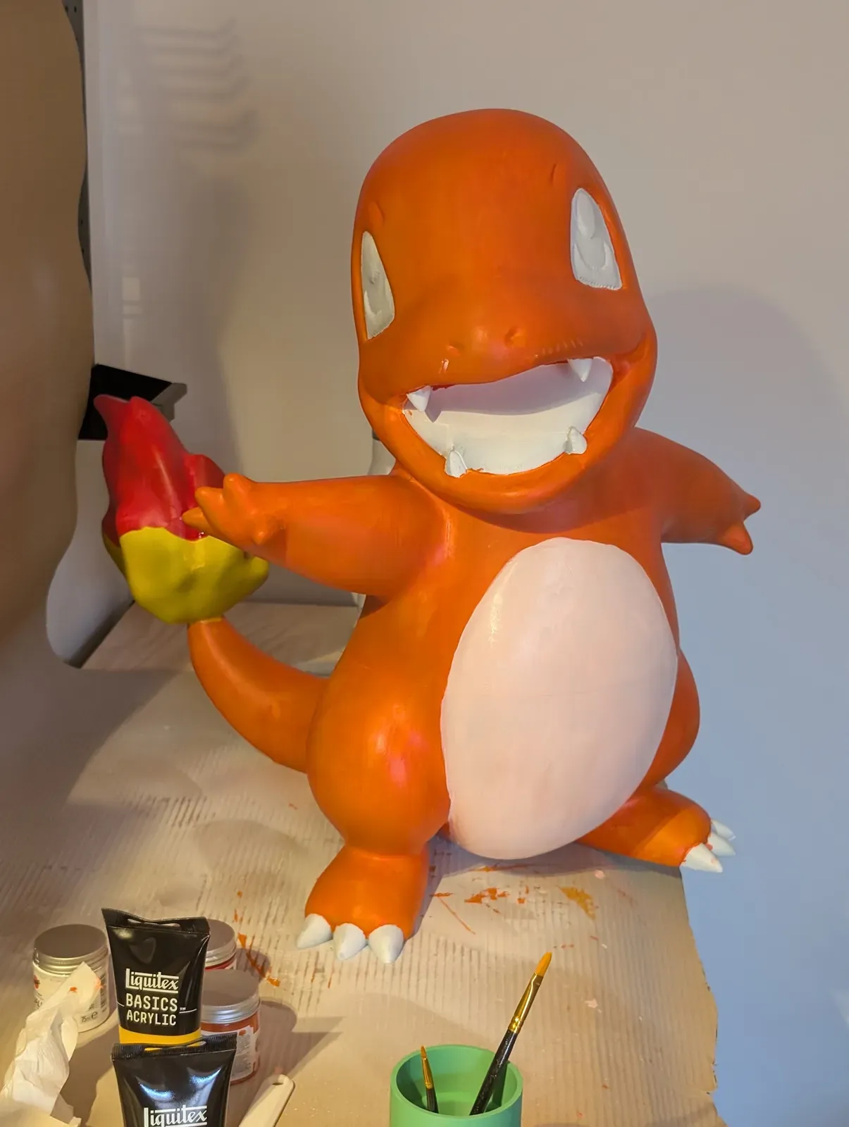 Charmander still being painted, the eyes not done yet