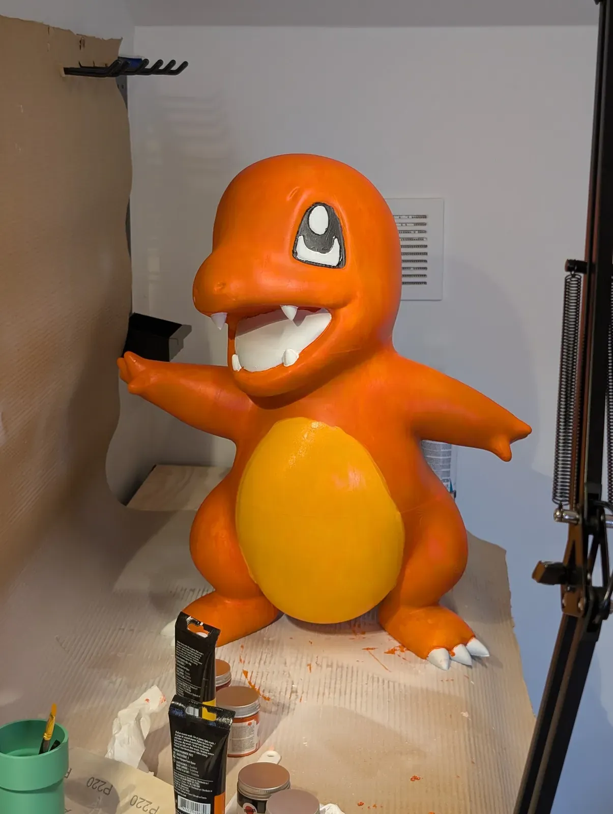 Charmander with the painting almost finished
